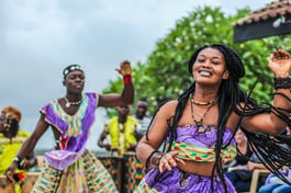 Community in Ghana performing traditional dance to C Merced and UC Berkley brigade volunteers in May 2019